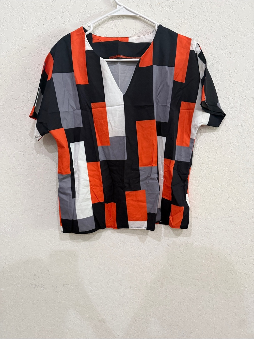 Women’s Geometric Colorblock V-Neck Top - Red, Black, Gray, White